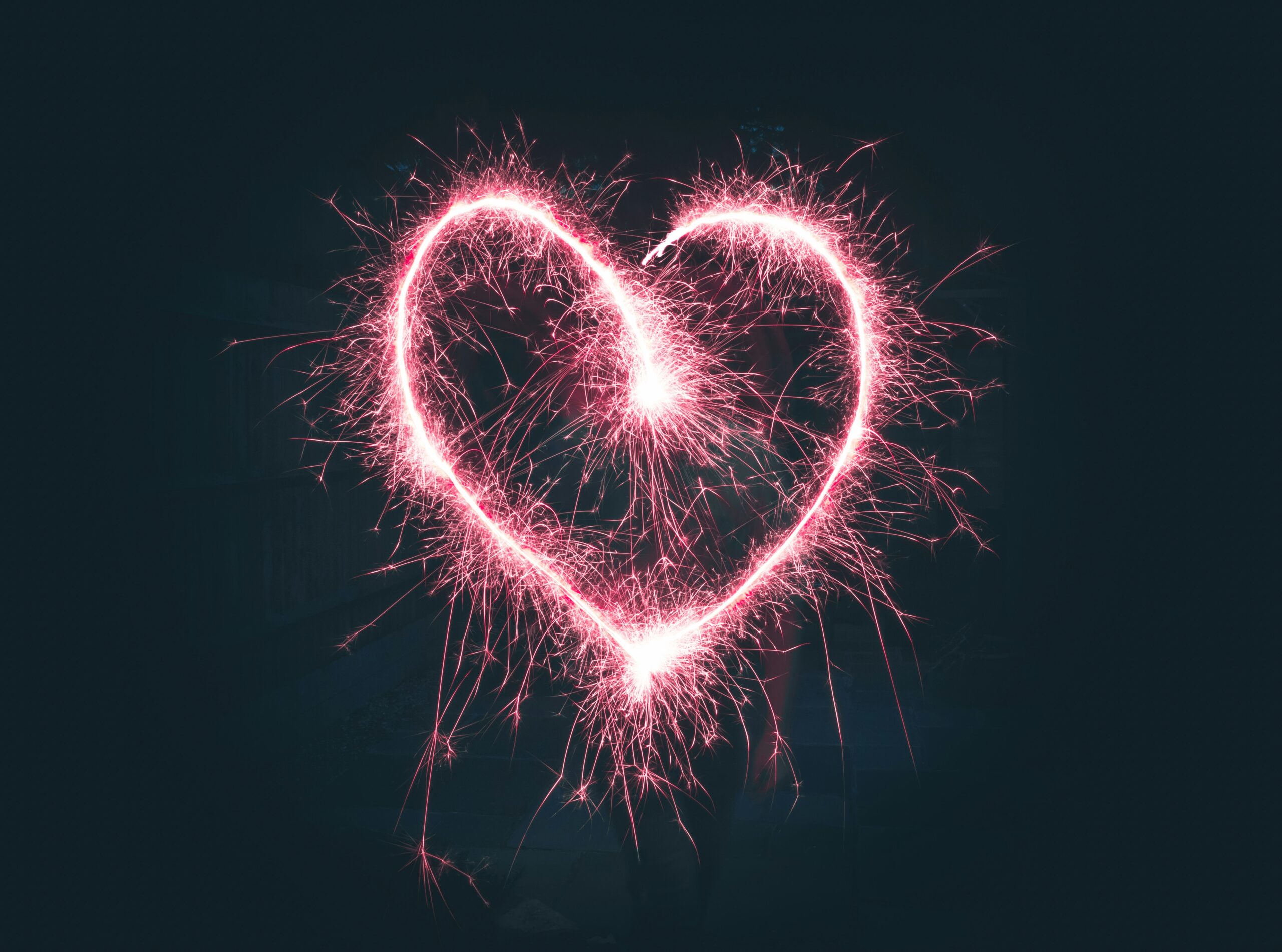 A heart shape made of fireworks, sparks